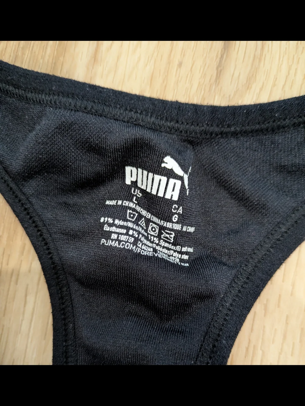 PUMA Black Racerback Logo-Trim Sports Bra - Picture 3 of 3